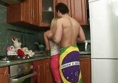 Lusty young amateur receives nailed in the kitchen