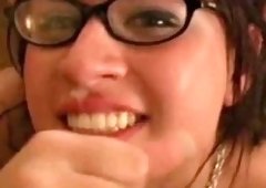 Latina beauty with glasses gives blowjob
